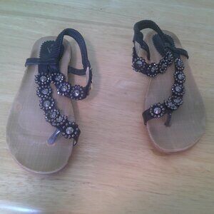 Black jeweled toe post sandal